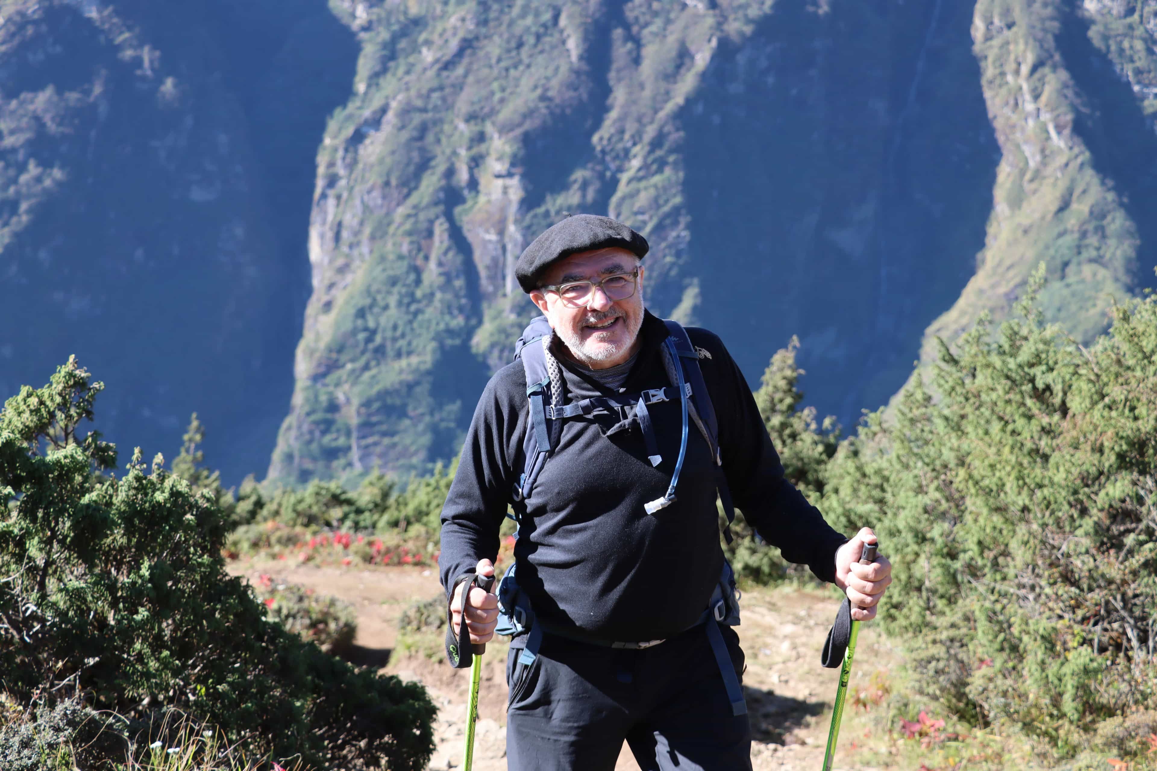 Elderly trekker fulfilling his Everest dream near Namche Bazaar